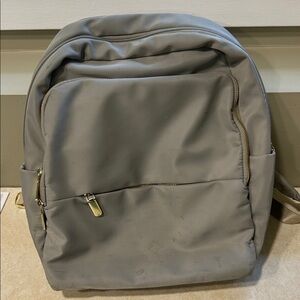 Gray Backpack with Gold Accents